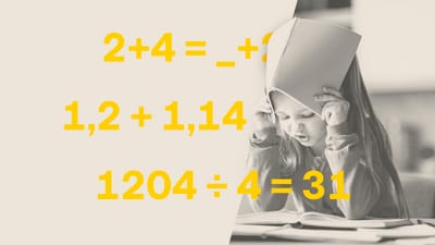 Pige fra indskolingen ser ned på nogle regnestykker, som er svære.