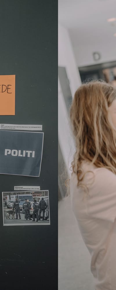 Tavler med uopklarede sager og to elever, som hænger medie-skilte op.