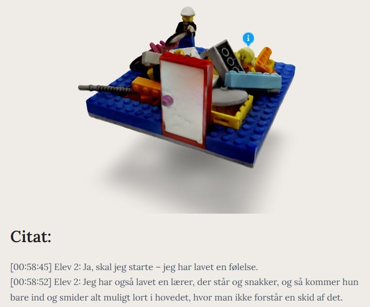 Billede af elevproduktion hvor elev er begravet i legoklodser